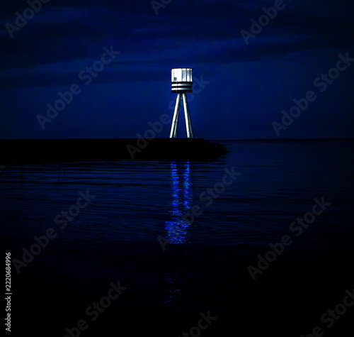 Illuminated Beacon Reflection in Water