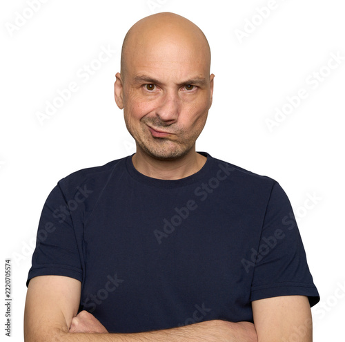 bald middle‑aged man with displeased expression on his face