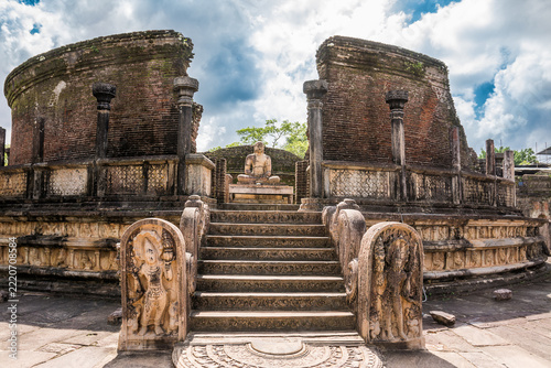 Ancient Buddhist Temple Ruins (Vatadage) and Seated Buddha Statue in Polonnaruwa,  Sri Lanka