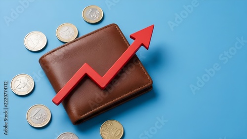 Brown leather wallet displaying rising red upward growth financial chart arrow symbol surrounded by shiny metallic euro coins against solid vibrant blue background