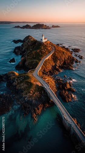 Coastal lighthouse and bridge landscape view at sunset or sunrise