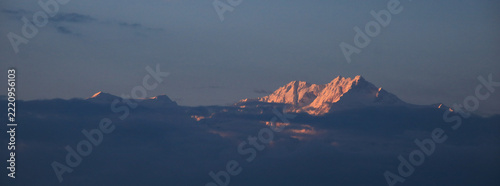 Peak of Mount Kanchenjunga at sunset, view from Darjeeling, India.