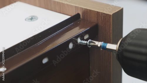 Assembling furniture with drawers using screws