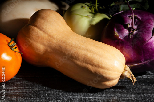 butternut vegetable mix on black wood background