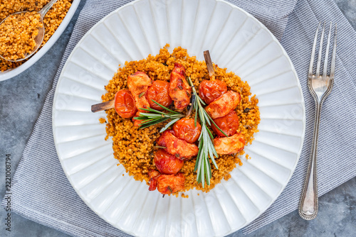 Spiced tomato and chicken skewers with mediterranean couscous
