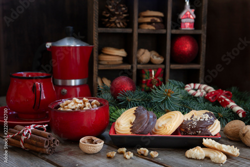Traditional German Spritzgeback Christmas Cookies with Chocolate and Nuts