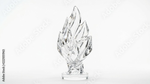 A beautifully crafted elegant crystal sculpture depicting a hand in a gentle blessing gesture on a pristine white backdrop