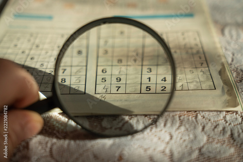 Solving a Sudoku Puzzle with a Magnifying Glass