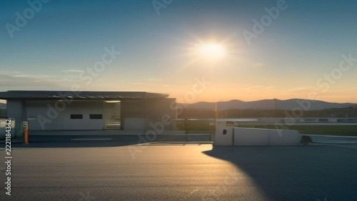 Modern Sustainable Infrastructure for Electric Vehicle Charging at a Renewable Energy Hub During a Golden Sunset