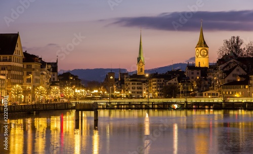 Zurich on banks of the Limmat river on a winter evening, Switzerland