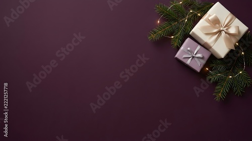 Christmas gift boxes with pine branches and fairy lights on a dark purple background