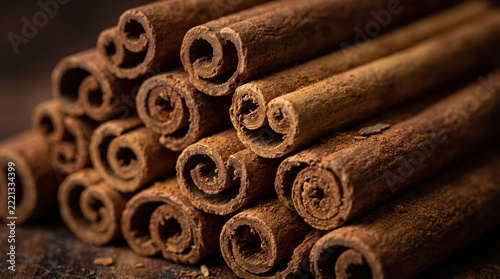 Stack of aromatic cinnamon sticks close up