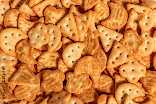 crackers texture closeup baked snack food surface detail golden brown shapes