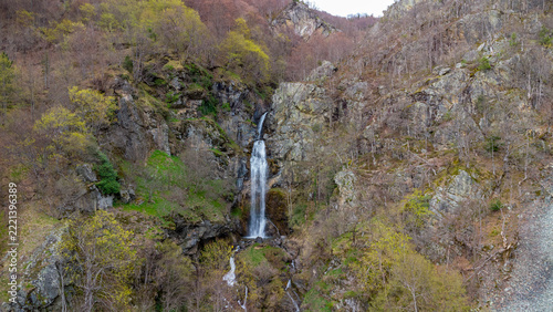 A high waterfall on a wild mountain river