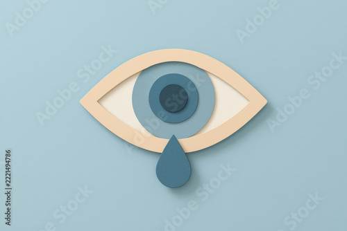 Paper cut eye with teardrop, layered blue circular design on soft blue background, symbolizing dry eye syndrome or emotional concept art