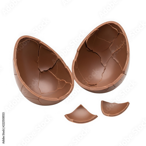 Two open hollow chocolate eggs with broken pieces