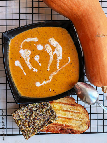 Creamy Butternut Squash Soup with Bread and Crackers