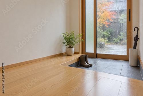 Modern Japanese genkan entrance on a rainy autumn day