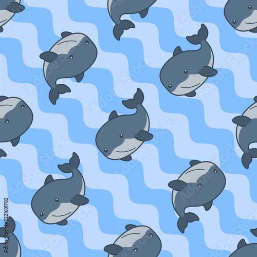 Adorable cartoon whales swimming in wavy blue ocean seamless pattern illustration