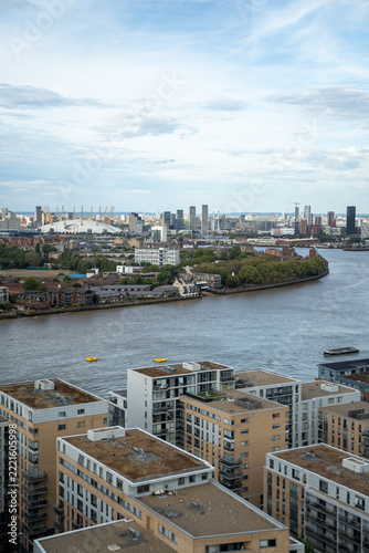 Photography Urban Riverside View With Modern Apartments and Large Dome