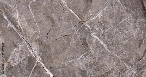 Abstract Weathered Sandstone Rock Texture with Pink Beige and Rust Colored Mineral Patterns
