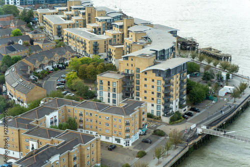 Photography Modern Waterfront Apartment Complex with Townhouses and Pier