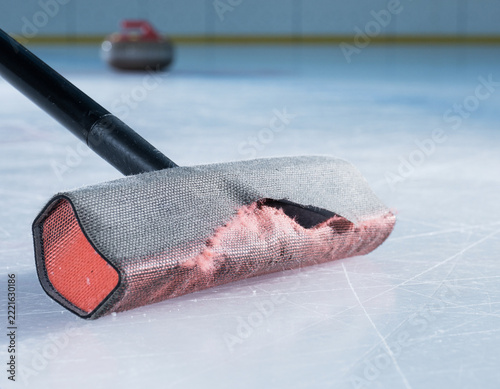 Worn Curling Broom Sweeping Pad on Indoor Ice Rink