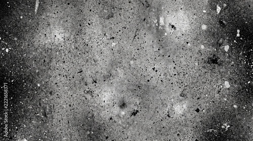 Dramatic black and white texture of weathered and scratched metal surface