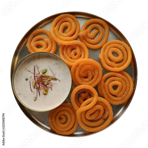 Jalebi sweets with rabri dip isolated on transparent background, traditional Indian dessert cutout