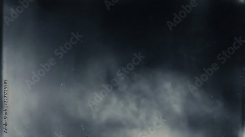 An abstract artistic representation featuring dark moody tones and soft blurred textures that create a mysterious and atmospheric visual experience