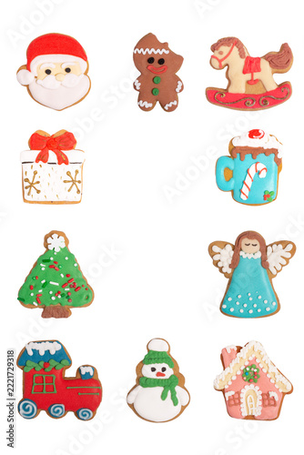 Vertical Christmas gingerbread cookies frame with blank copy space in center isolated on white background. Set of 10 decorated icing holiday cookies