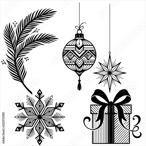 Festive winter holiday decorations featuring snowflake and christmas gift box