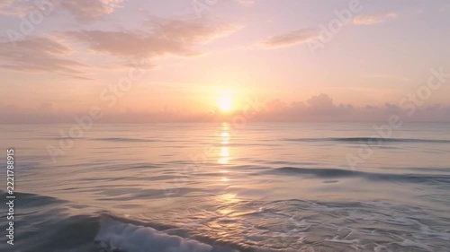 Sunrise Over Calm Ocean in Soft Light
