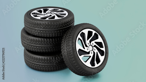 Low profile sport tyre and rims isolated on green background. 3D illustration