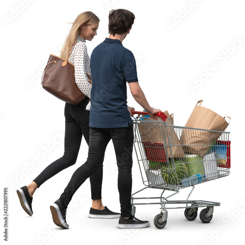 Young couple with a shopping trolley buying groceries together, isolated on white and transparent background