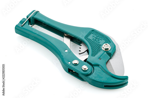 Pipe cutter for plastic and PVC pipes isolated on white background. Plastic pipe cutting shears, a manual construction tool.