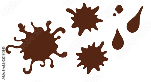 A collection of dark brown mud or chocolate splashes and droplets on a white background