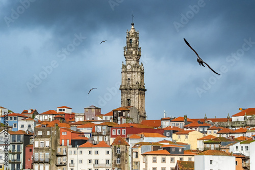 Clerigos Tower rising above orange tile rooftops of Porto old town