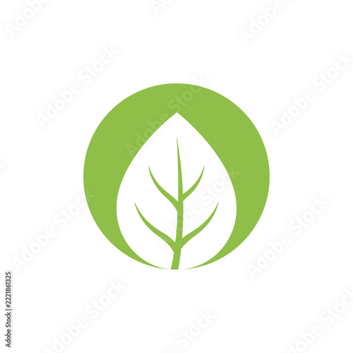 Minimalist white leaf vector logo design inside a green circle frame using negative space, isolated on white background.