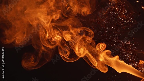 Swirling Orange Smoke and Glowing Embers on a Pure Black Background