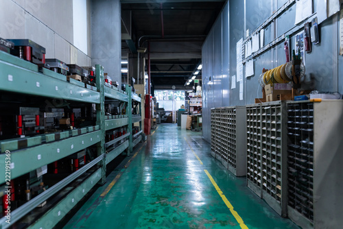 A factory scene. Manufacturing, tools, workshop, factory, supplier, small factory, machinery, molds, tidiness, aisle, industry, work, small and medium-sized enterprises.
