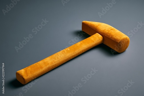 Hammer completely upholstered in plush fabric