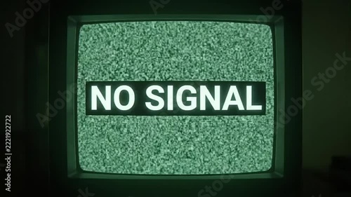 Retro glitch effect with no signal text on old television screens