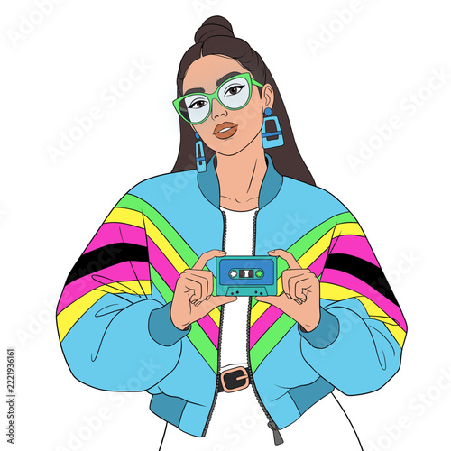 Young woman in vibrant street outfit holding a retro cassette player  