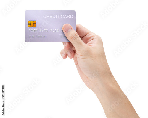 A close-up man hand holds a silver card isolated on white background with a clipping path.
