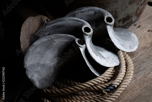 A removed, old boat propeller.