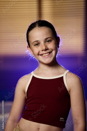 Young girl smiling portrait enjoying childhood happiness