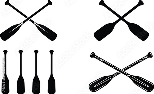 Crossed boat oars and paddles silhouette set for rowing sport nautical club badge and marine adventure design