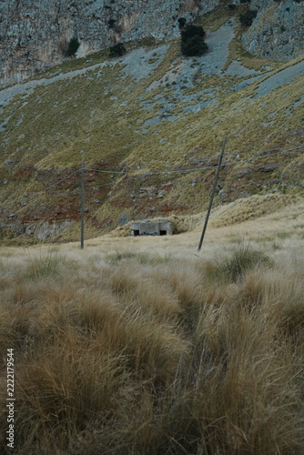 Small Concrete Structure in Grassy Highland