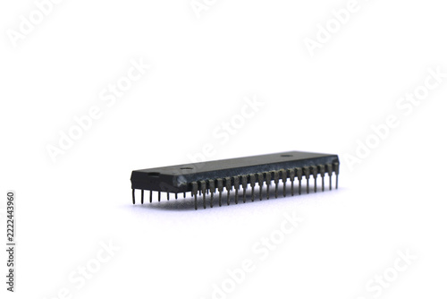 A blurry microcontroller on a white background. An archaic concept of technological advancement.